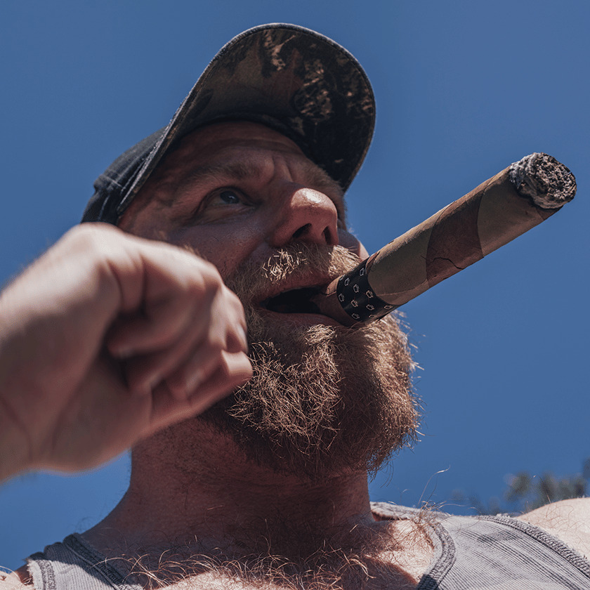 Drummer Mag Pic Of Hairy Bear Smoking A Cigar
